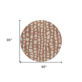 8' Orange And Ivory Round Abstract Washable Indoor Outdoor Area Rug