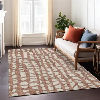 10' X 14' Orange And Ivory Abstract Washable Indoor Outdoor Area Rug