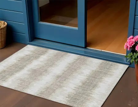 3' X 5' Ivory Beige And Taupe Striped Washable Indoor Outdoor Area Rug