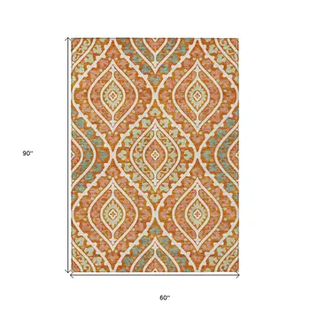 5' X 8' Orange Peach And Ivory Floral Washable Indoor Outdoor Area Rug