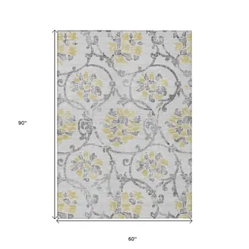 5' X 8' Silver Gray And Gold Floral Washable Indoor Outdoor Area Rug