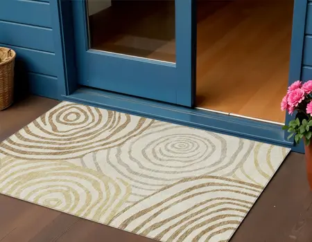 3' X 5' Gold Ivory And Beige Abstract Washable Indoor Outdoor Area Rug