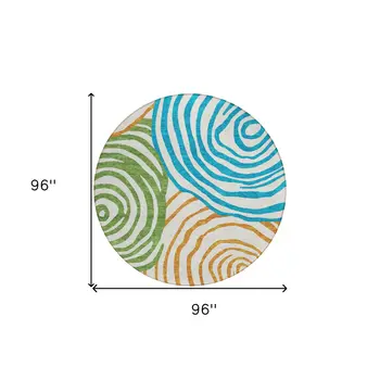8' White Orange And Teal Blue Round Abstract Washable Indoor Outdoor Area Rug