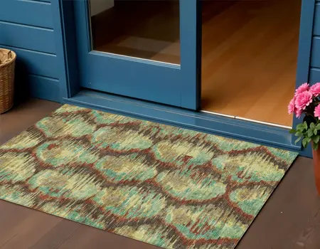 3' X 5' Brown Gold And Teal Blue Abstract Washable Indoor Outdoor Area Rug