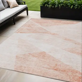 5' X 8' Salmon Peach And Ivory Abstract Washable Indoor Outdoor Area Rug