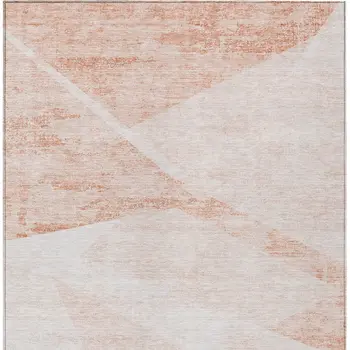 5' X 8' Salmon Peach And Ivory Abstract Washable Indoor Outdoor Area Rug