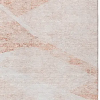 8' X 10' Salmon Peach And Ivory Abstract Washable Indoor Outdoor Area Rug