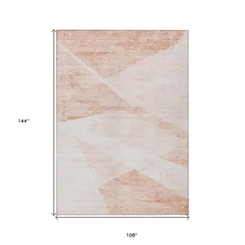 9' X 12' Salmon Peach And Ivory Abstract Washable Indoor Outdoor Area Rug