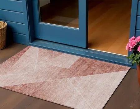 3' X 5' Salmon And Ivory Abstract Washable Indoor Outdoor Area Rug