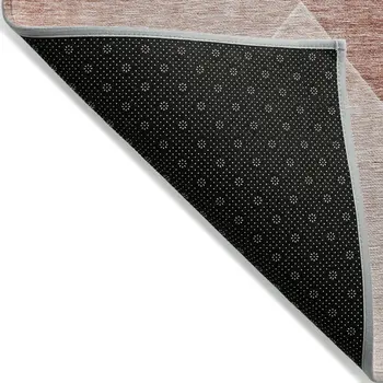 5' X 8' Salmon And Ivory Abstract Washable Indoor Outdoor Area Rug