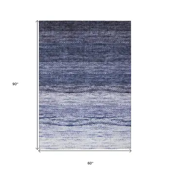 5' X 8' Navy Blue And Ivory Ombre Washable Indoor Outdoor Area Rug