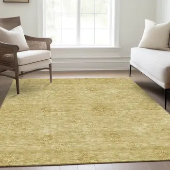 5' X 8' Gold And Ivory Floral Washable Indoor Outdoor Area Rug