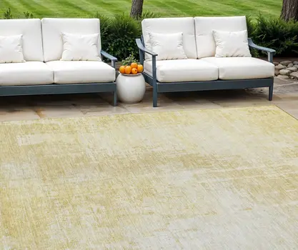 9' X 12' Gold Ivory And Beige Abstract Washable Indoor Outdoor Area Rug