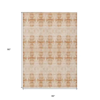5' X 8' Salmon And Ivory Geometric Washable Indoor Outdoor Area Rug
