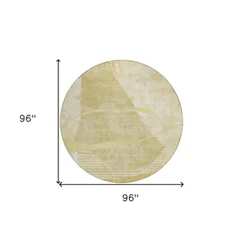 8' Wheat Gold And Ivory Round Abstract Washable Indoor Outdoor Area Rug