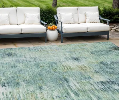 9' X 12' Teal Blue Green And Ivory Abstract Washable Indoor Outdoor Area Rug