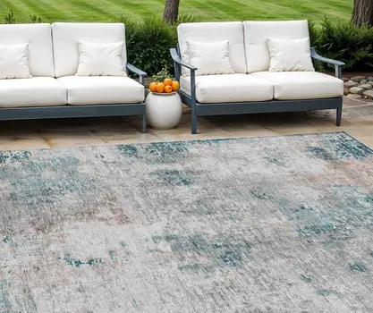 10' X 14' Teal Blue Beige And Copper Abstract Washable Indoor Outdoor Area Rug