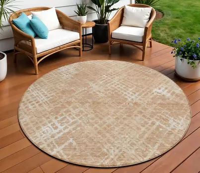 8' Coral Ivory And Peach Round Geometric Washable Indoor Outdoor Area Rug