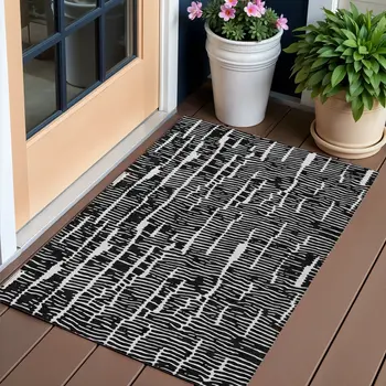3' X 5' Black And Ivory Abstract Washable Indoor Outdoor Area Rug