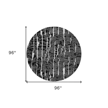 8' Black And Ivory Round Abstract Washable Indoor Outdoor Area Rug