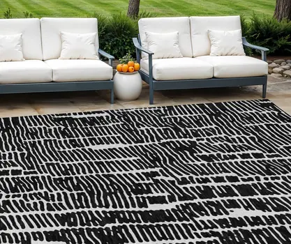 10' X 14' Black And Ivory Abstract Washable Indoor Outdoor Area Rug