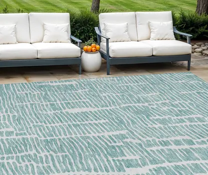 9' X 12' Teal Blue And Ivory Abstract Washable Indoor Outdoor Area Rug