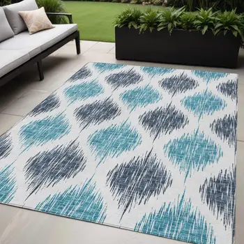 5' X 8' Teal Blue And Ivory Ikat Washable Indoor Outdoor Area Rug
