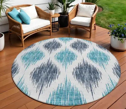 8' Teal Blue And Ivory Round Ikat Washable Indoor Outdoor Area Rug