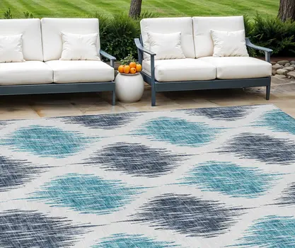 8' X 10' Teal Blue And Ivory Ikat Washable Indoor Outdoor Area Rug