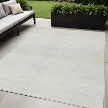 5' X 8' Ivory And Beige Striped Washable Indoor Outdoor Area Rug