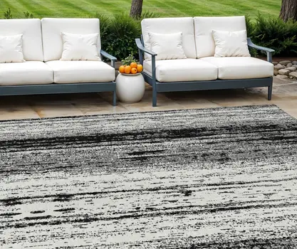 9' X 12' Black And Ivory Striped Washable Indoor Outdoor Area Rug