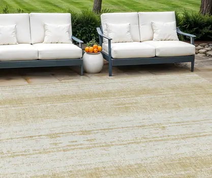 10' X 14' Gold And Ivory Striped Washable Indoor Outdoor Area Rug