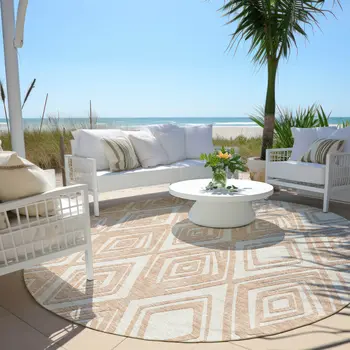8' Peach And Ivory Round Geometric Washable Indoor Outdoor Area Rug