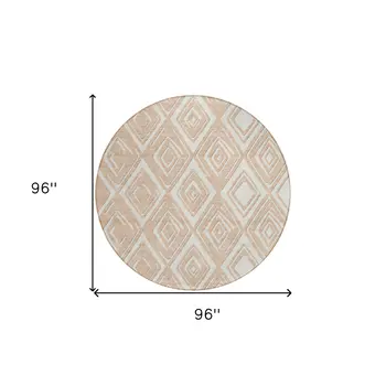 8' Peach And Ivory Round Geometric Washable Indoor Outdoor Area Rug