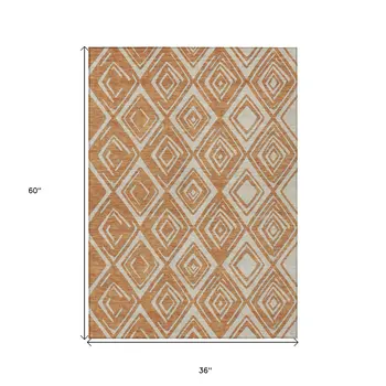 3' X 5' Orange And Ivory Geometric Washable Indoor Outdoor Area Rug