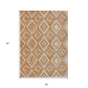 5' X 8' Orange And Ivory Geometric Washable Indoor Outdoor Area Rug