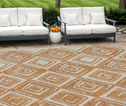 9' X 12' Orange And Ivory Geometric Washable Indoor Outdoor Area Rug