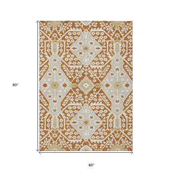 5' X 8' Orange Beige And Gold Floral Washable Indoor Outdoor Area Rug