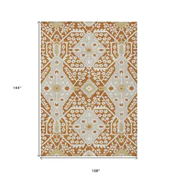 9' X 12' Orange Beige And Gold Floral Washable Indoor Outdoor Area Rug