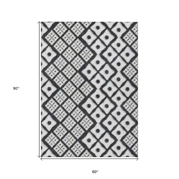 5' X 8' Black And Ivory Geometric Washable Indoor Outdoor Area Rug