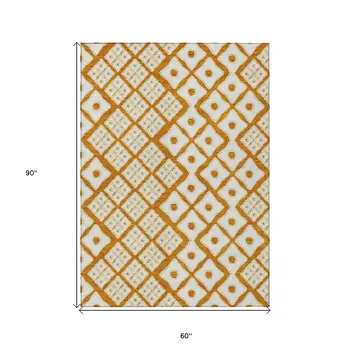 5' X 8' Orange And Ivory Geometric Washable Indoor Outdoor Area Rug