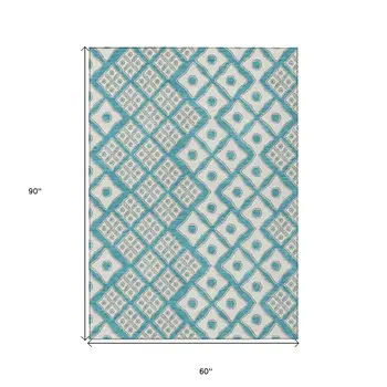 5' X 8' Teal Blue And Ivory Geometric Washable Indoor Outdoor Area Rug