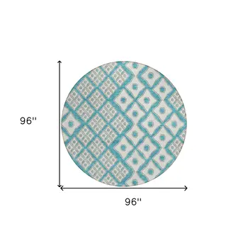 8' Teal Blue And Ivory Round Geometric Washable Indoor Outdoor Area Rug