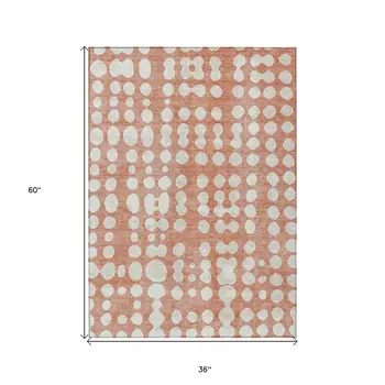 3' X 5' Salmon And Ivory Abstract Washable Indoor Outdoor Area Rug