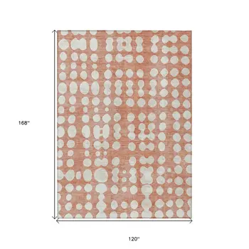 10' X 14' Salmon And Ivory Abstract Washable Indoor Outdoor Area Rug