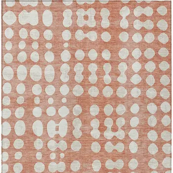 10' X 14' Salmon And Ivory Abstract Washable Indoor Outdoor Area Rug