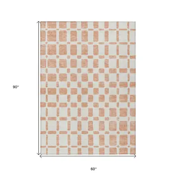 5' X 8' Peach And Beige Geometric Washable Indoor Outdoor Area Rug