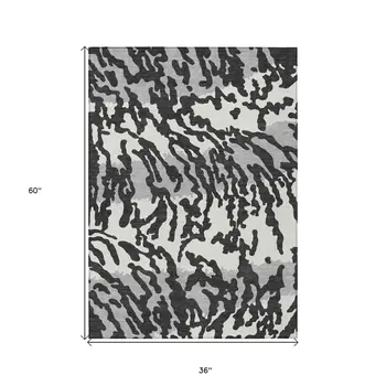 3' X 5' Black Gray And Ivory Animal Print Washable Indoor Outdoor Area Rug