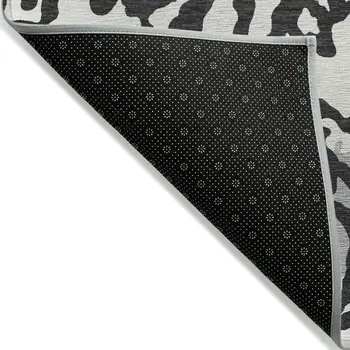 5' X 8' Black Gray And Ivory Animal Print Washable Indoor Outdoor Area Rug