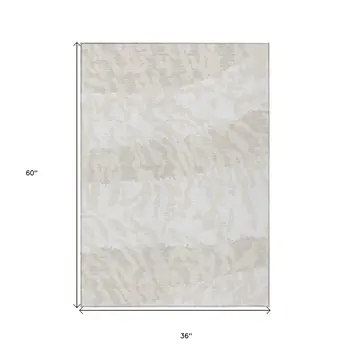 3' X 5' Ivory And Beige Animal Print Washable Indoor Outdoor Area Rug